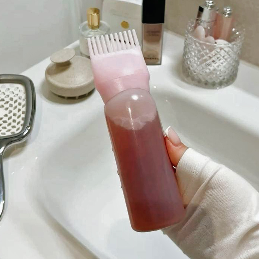 مشط وموزع الزيت