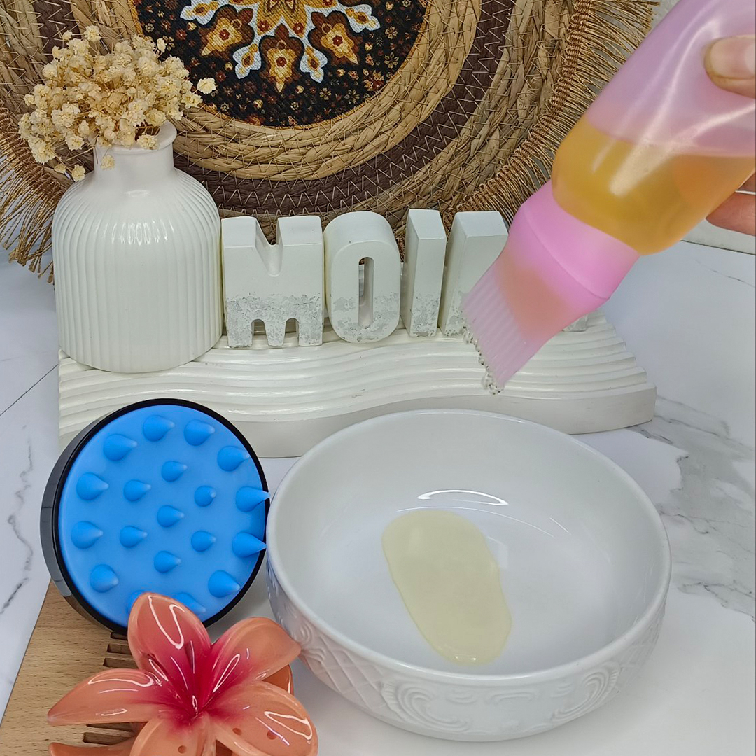 مشط وموزع الزيت